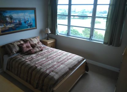 Second bedroom with a view of the waterway